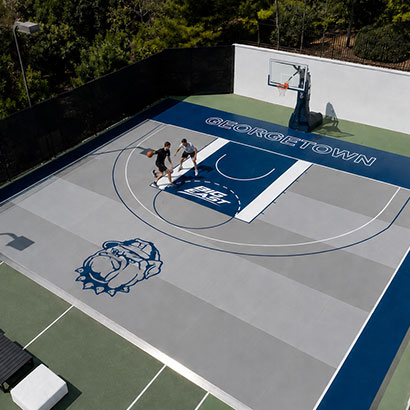 USA backyard basketball court on interlocking court tiles